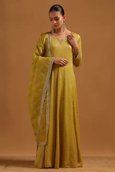 Mustard Tissue Woven Design Gown With Hand Embroidery and Bead & Stone Details